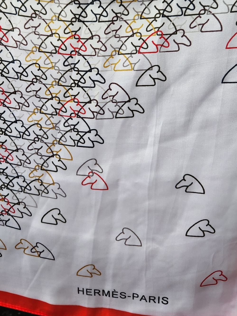 Hermès White Scarf with Red, Black, Gold and Gray Motif